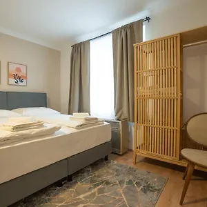 Stephansplatz View: Spacious 2-bedroom With Balcony Apartment